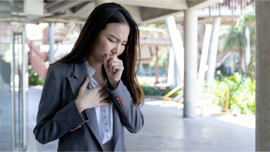 Woman having an asthma attack