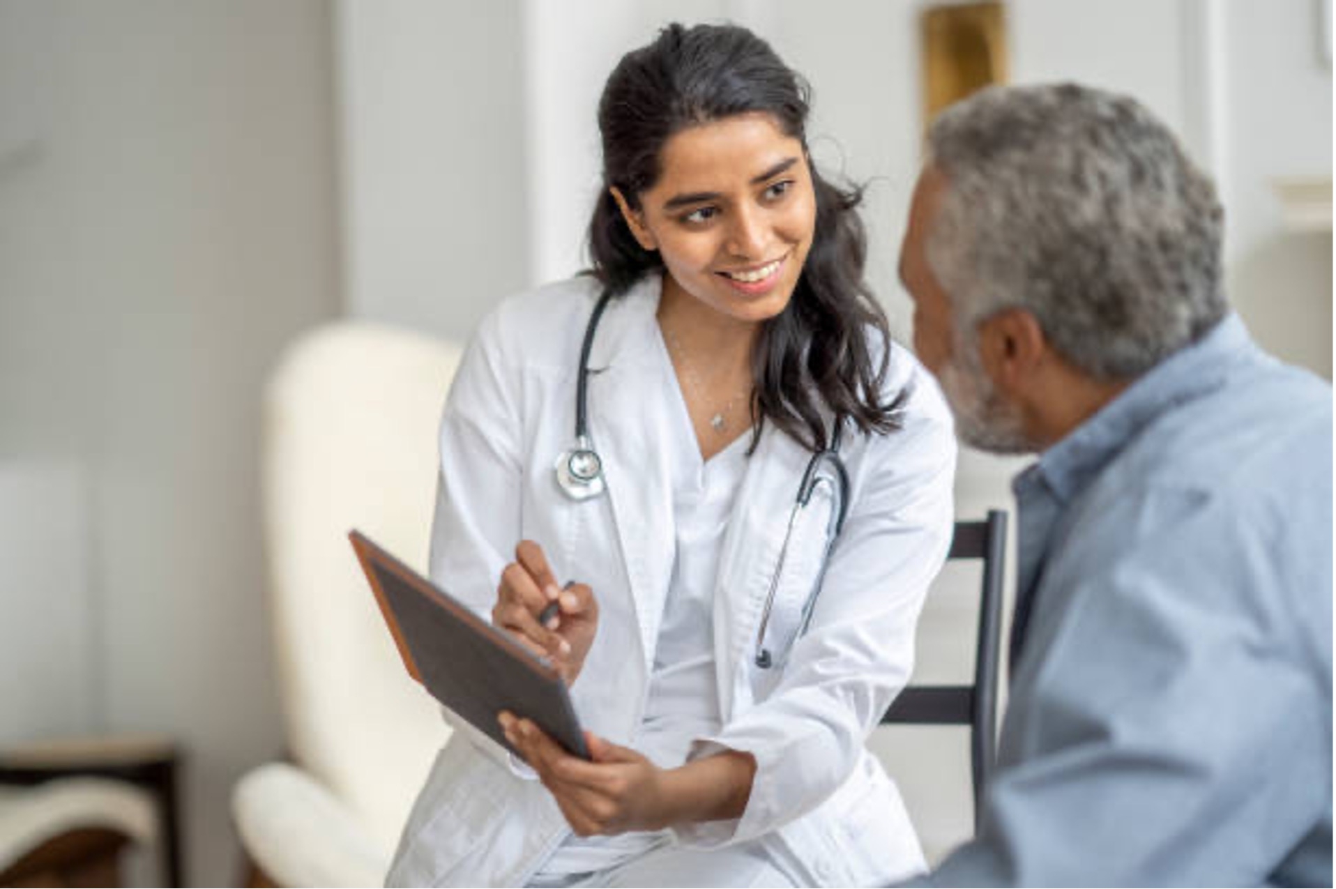 Doctor speaking to a patient about abscess 