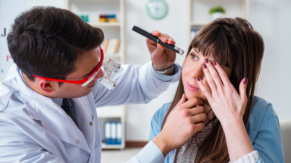 CityMD doctor examining patient’s corneal abrasion