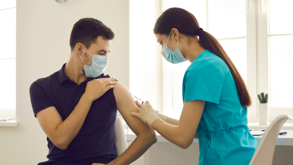 CityMD doctor administering travel vaccine