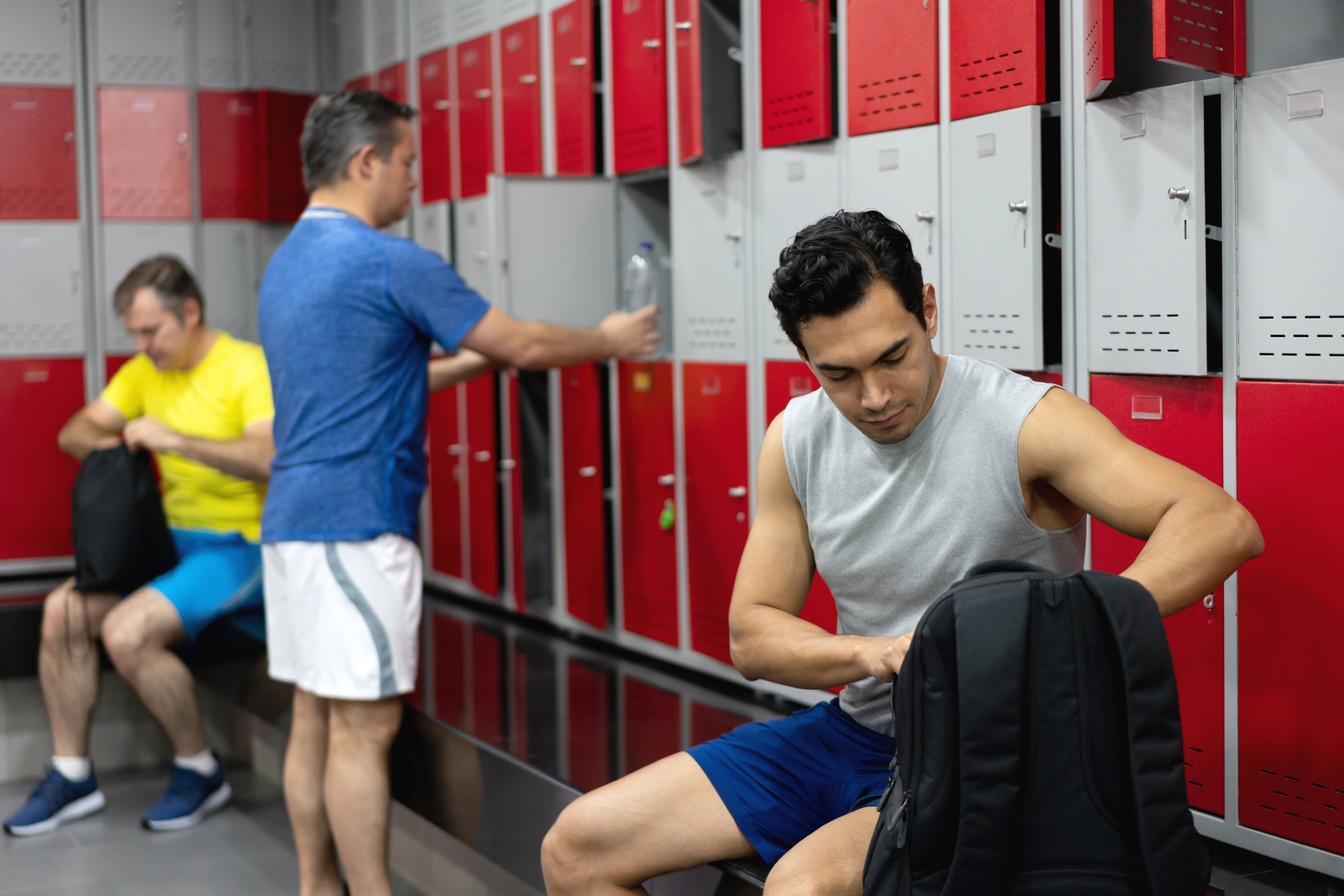 Men in a gym locker room