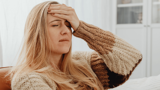 Woman suffering from tension headaches