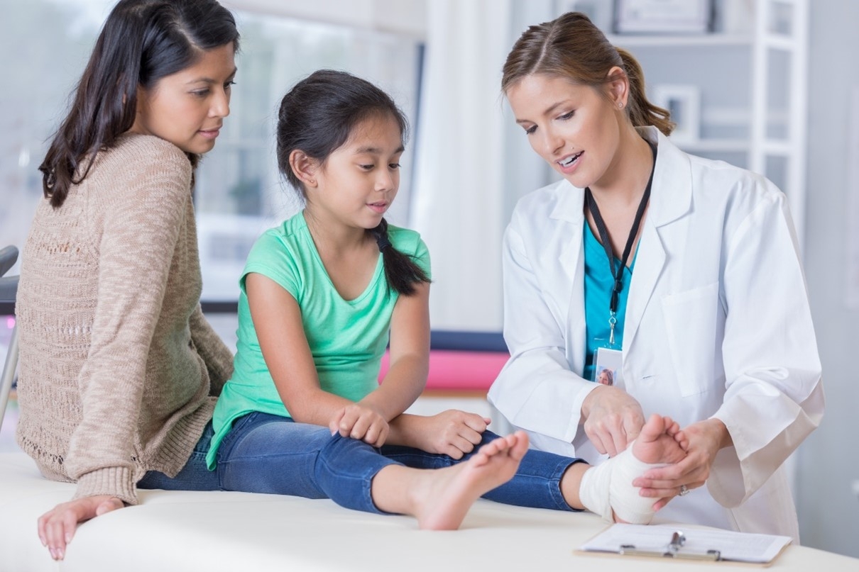 Child receiving pediatric care