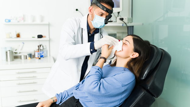 CityMD doctor showing patient how to stop a nosebleed fast